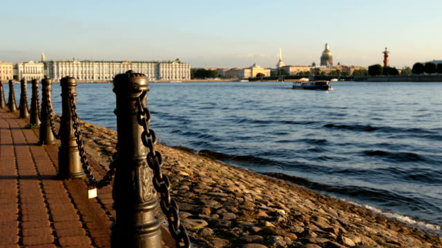 Iron-columns-on-an-embankment-of-the-Neva-river-in-the-summer---St.-Petersburg,-Russia