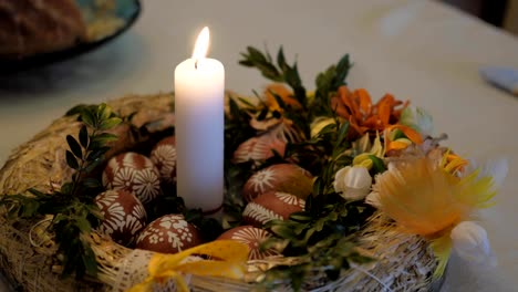 easter-candle-among-wax-and-onion-painted-easter-eggs