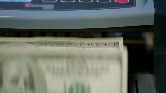 Máquina-contar-billetes.-Concepto-de-actividad-bancaria.-Cálculo-de-papel-moneda