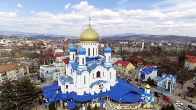Aerial-footage-of-Uzhgorod-city-center---top-view-of-church-in-summer.-Day-time