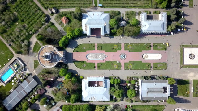 Panoramic-video-shooting-from-the-drone-above-the-central-square-of-the-National-Exhibition-Center-in-Kiev,-Ukraine.-Dolly-out-motion-view-from-drone-in-FullHD