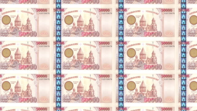 Banknotes-of-fifty-thousand-armenian-drams-of-the-bank-of-Armenia-rolling-on-screen,-coins-of-the-world,-cash-money,-loop