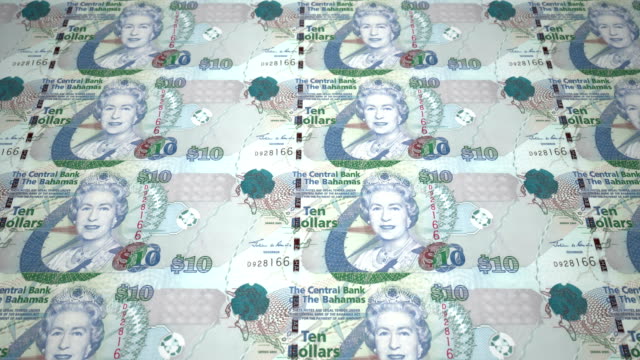 Billetes-de-diez-dólares-de-Bahamas-en-pantalla,-dinero-en-efectivo,-lazo