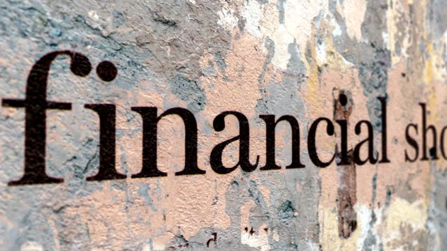 Finanzielle-Schocks-Text-auf-Grunge-Hintergrund