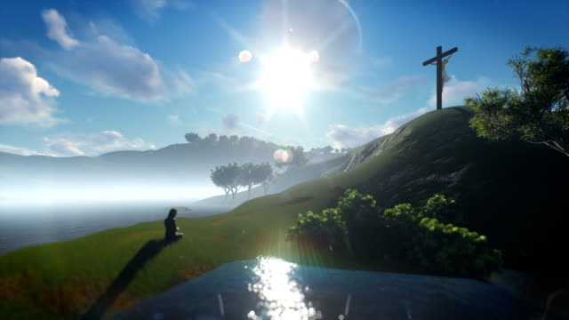 Christian-woman-praying-at-Jesus-cross,-blue-sky,-4K