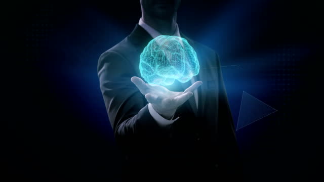 Businessman-opens-palm,-Dots-connected-Brain-shape,-digital-lines-grow-future-artificial-intelligence.-4K-movie.