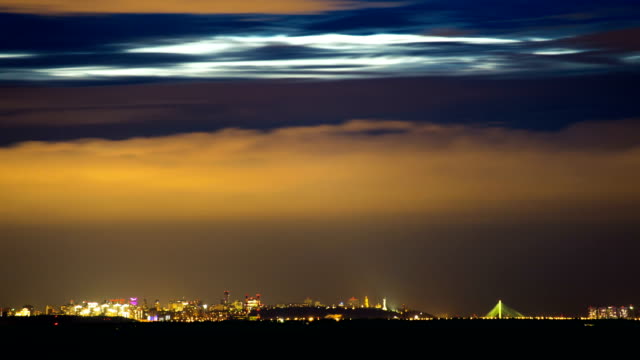 Distant-view-of-city-skyline-at-night.