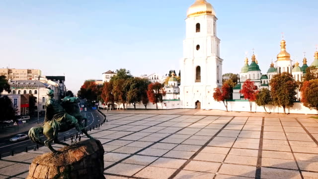 Saint-Sophia's-Cathedral,-square-with-Bohdan-Khmelnytsky-Monument.-Kiev-Kiyv-Ukraine-with-Places-of-Interest.-Aerial-drone-video-footage.-Sunrise-light