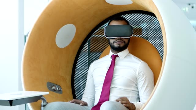 Serious-businessman-in-vr-headset