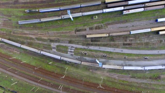 Aerial-view.-Trains-moving-out-from-platform-of-railway-station