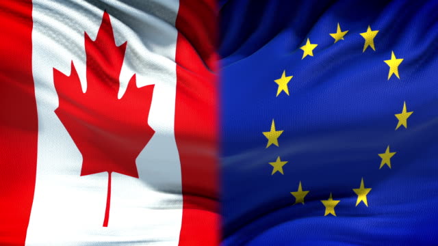Fondo-banderas-de-Canadá-y-la-Unión-Europea,-las-relaciones-diplomáticas-y-económicas