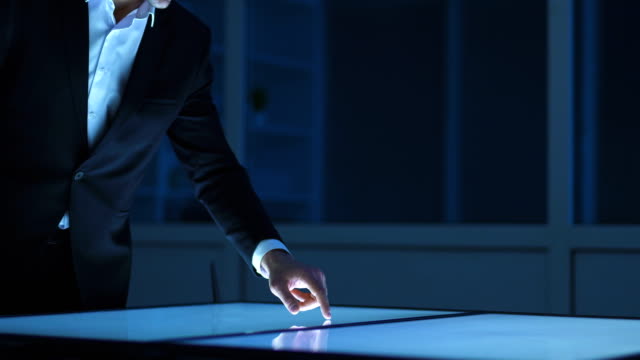 The-businessman-working-with-a-sensor-screen