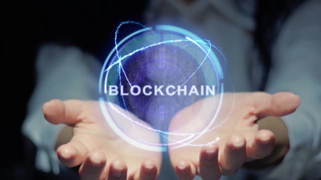 Las-manos-muestran-el-holograma-Round-blockchain