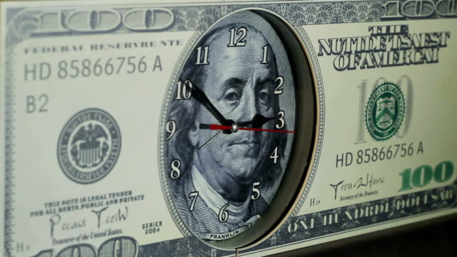 Time-is-money.The-clock-on-the-hundred-dollar-bill.