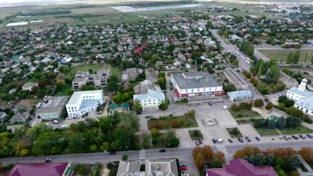 Gorgeous-bird`s-eye-view-of-a-large-city-in-the-south-of-Ukraine-with-big-administrative-buildings,-comfortable-private-houses-and-greenery