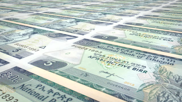 Banknotes-of-five-Ethiopian-birr-of-Ethiopia-rolling,-cash-money,-loop