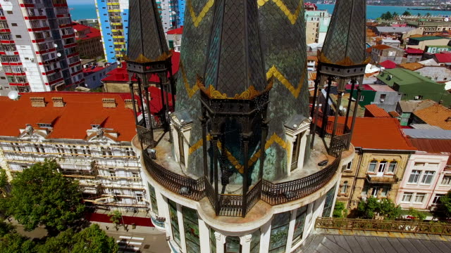 Observation-deck-of-Astronomical-clock-tower-in-Batumi-against-Europe-Square