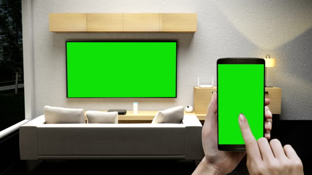 Green-Screen,-berühren-IoT-smart-Phone,-mobile-Kontrolle-im-Wohnzimmer,-intelligente-Haushaltsgeräte,-Internet-der-Dinge.-4-k-Film.