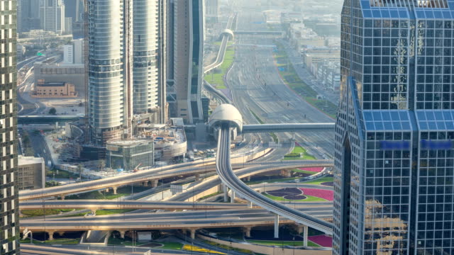Traffic-on-a-busy-intersection-on-Sheikh-Zayed-highway-aerial-timelapse