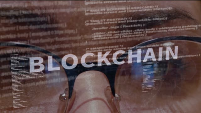 Blockchain-text-on-background-of-developer