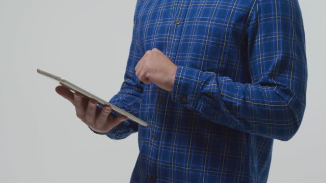 Man-using-tablet