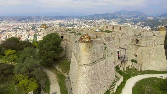 Quadrocopter-flying-around-old-fortress-of-Menton,-shooting-breathtaking-view