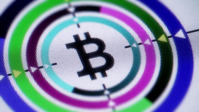 Die-Bitcoin-Symbol-auf-dem-Bildschirm.-Looping.