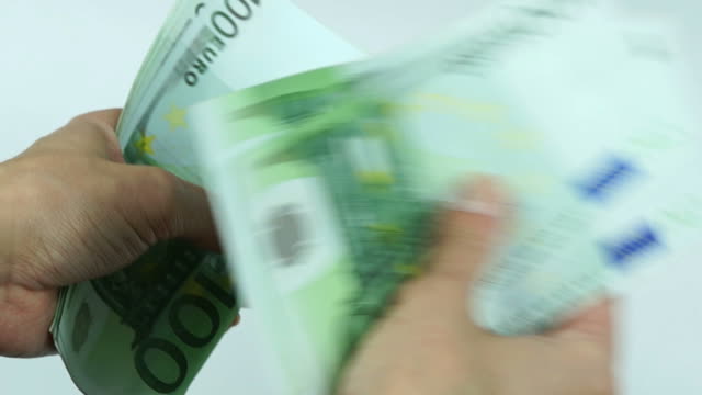 Woman-counts-euro-banknotes