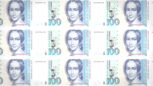 Banknoten-von-100-DM-oder-DM-der-Bank-der-alten-Bundesrepublik-Deutschland-oder-BRD-Rollen-auf-dem-Bildschirm,-Münzen-der-Welt,-Bargeld,-Schleife