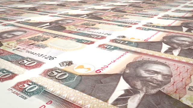 Billetes-de-50-chelines-kenianos-de-Kenia-rodando,-dinero-en-efectivo,-lazo