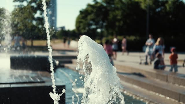 Water-fountain-in-park-at-sunset.-Slow-motion