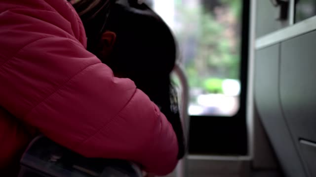 Hearing-loss-child-sleeping-on-the-seat.-In-the-shaking-bus.