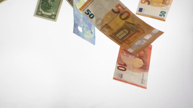 Different-banknotes-falling-in-slowmotion