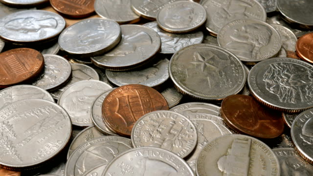 American-money.-Large-pile-of-coins-of-American-cents-of-different-denominations.
