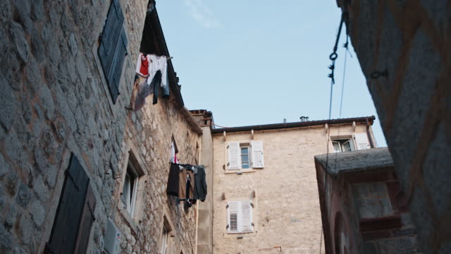 Kotor-old-town-street-view,-with-clothes-line