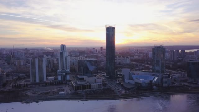 Sunset-in-megapolis.-Clip.-Beautiful-cityscape-with-top-view-on-skyscrapers.-Top-view-of-a-sunset-on-the-background-of-a-skyscraper