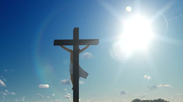 Jesus-cross-against-blue-sky,-zoom-out