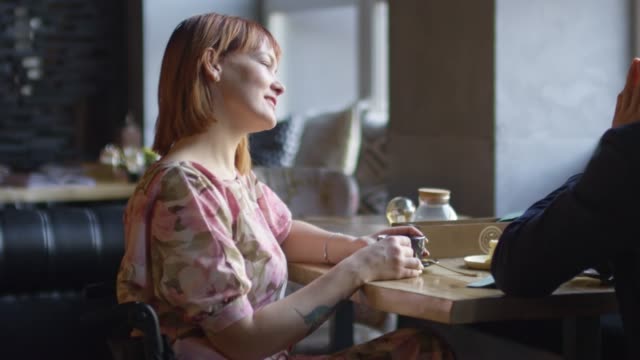 Paraplegic-Woman-on-Date-in-Cafe