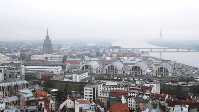 Riga,-Latvia.-Top-View-Cityscape-In-Misty-Fog-Rainy-Day.-Latvian-Academy-Of-Sciences,-Built-On-Model-Of-Moscow-Stalin-Skyscrapers,-Bus-Station-International-Coach-Terminal-And-Central-Market