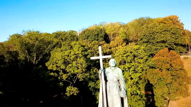 Kiev-Ukraine-Saint-Vladimir-monument-Hill-video-footage.-Aerial-view-from-above.-the-camera-moves-up-and-opens-the-panorama-to-St.-Michael's-Golden-Domed-Monastery-and-Saint-Sophia's-Cathedral