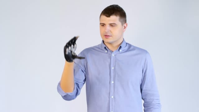 Amputee-Man-with-Prosthetic-Arm-Showing-OK