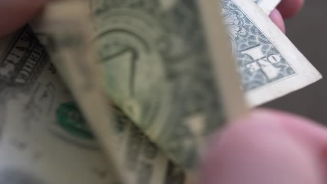 Counting-Dollar-Bills-Cash-Close-up