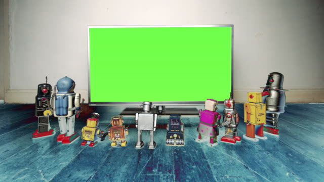 Retro-Roboter-gehen-in-und-beobachten-Sie-einen-Film-dann-gehen-Stop-Bewegung