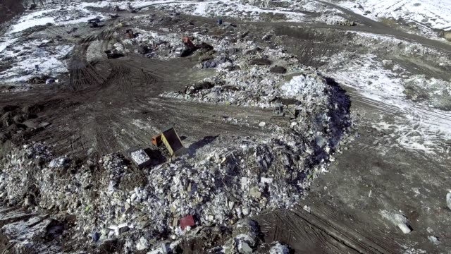 AERIAL:-Movie-of-a-truck-working-in-a-landfill