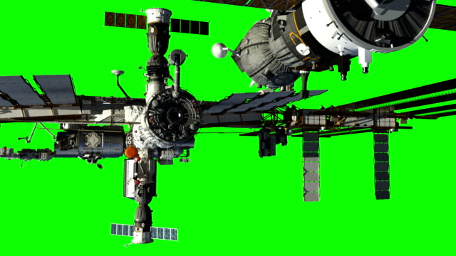 Nave-espacial-de-acoplamiento-a-estación-espacial-internacional.-Pantalla-verde.