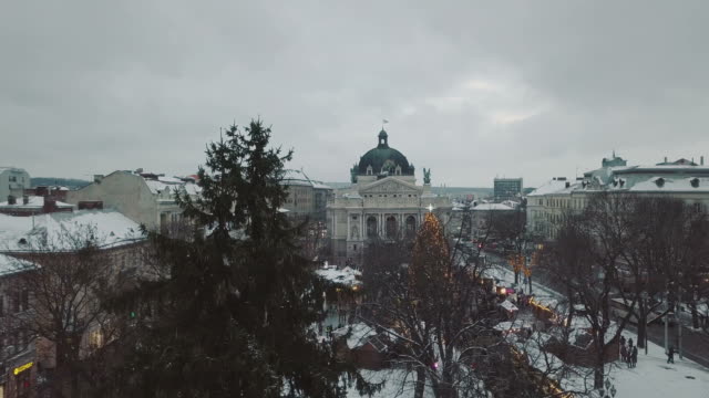 Lviv,-Ukraine.-Arial-shot.-Opera-house.-Christmas-tree.-Christmas-Fair.-People-are-walking-around-the-city-center.-Winter