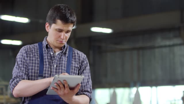 Worker-Using-Tablet