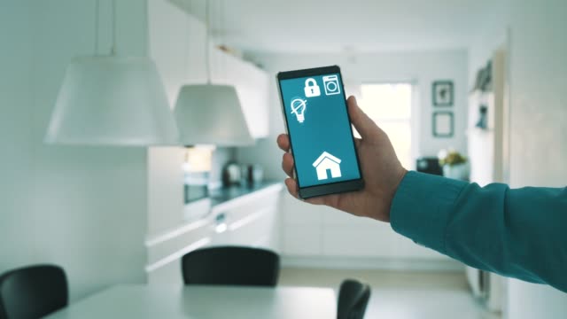 App-on-mobile-phone-controls-light-bulbs-in-smart-home