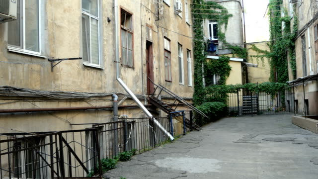 Cozy-narrow-courtyard-among-the-old-houses-in-the-city.