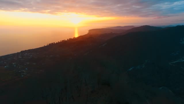 Aerial-view-of-the-sea-landscape-with-a-beautiful-sunset.-New-Athos,-Abkhazia